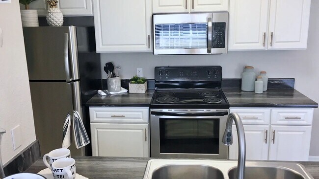 Take advantage of our premium renovation package in select homes and enjoy black-fusion counter tops in your updated kitchen. Your culinary endeavors just got a chic makeover! - Exchange on the 8