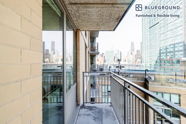 Photo - 4-75-75 48th Ave Unit FL10-ID1789