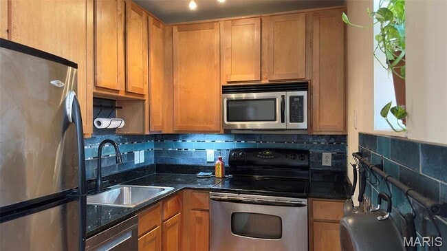 Photo - 5677 Waterman Blvd Unit 32
