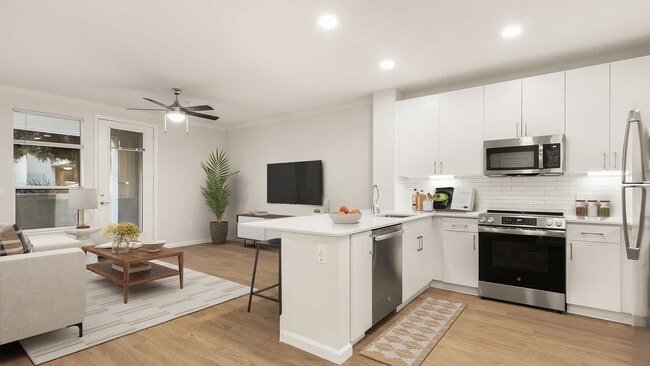 Kitchen with Stainless Steel Appliances - Park Place at San Mateo
