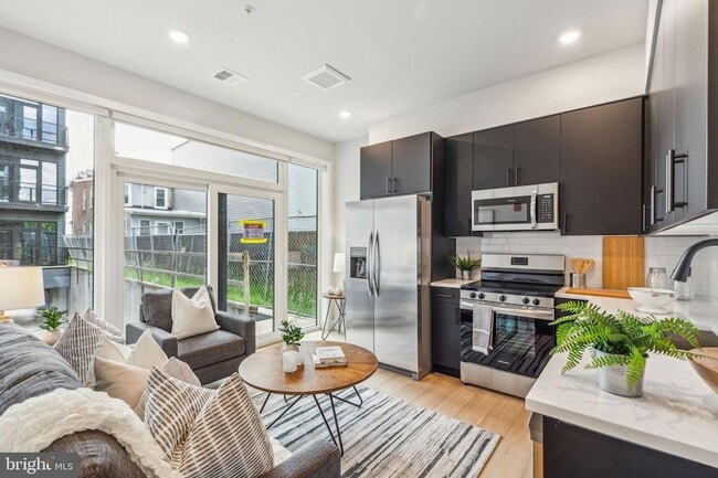 Building Photo - 6910 Ridge Ave Unit 305