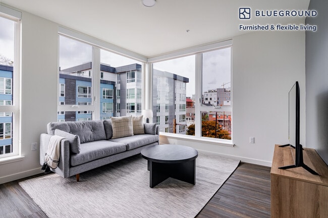 Building Photo - 1000 E Yesler Wy Unit FL8-ID846