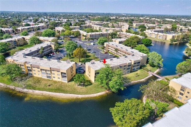 Building Photo - 5860 NW 64th Ave Unit 102