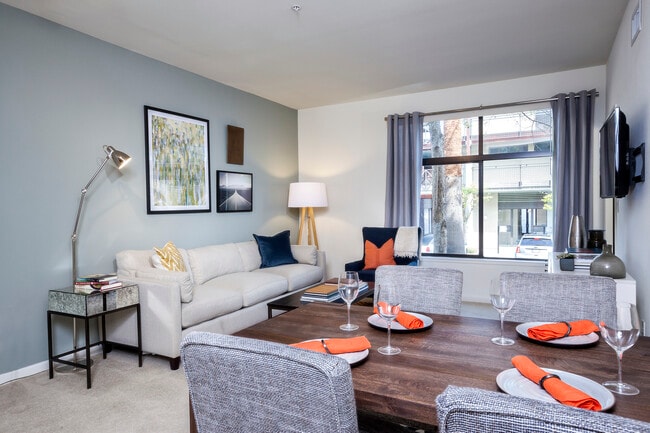 Classic Package I dining and living room with carpet (select homes) - Avalon at Cahill Park