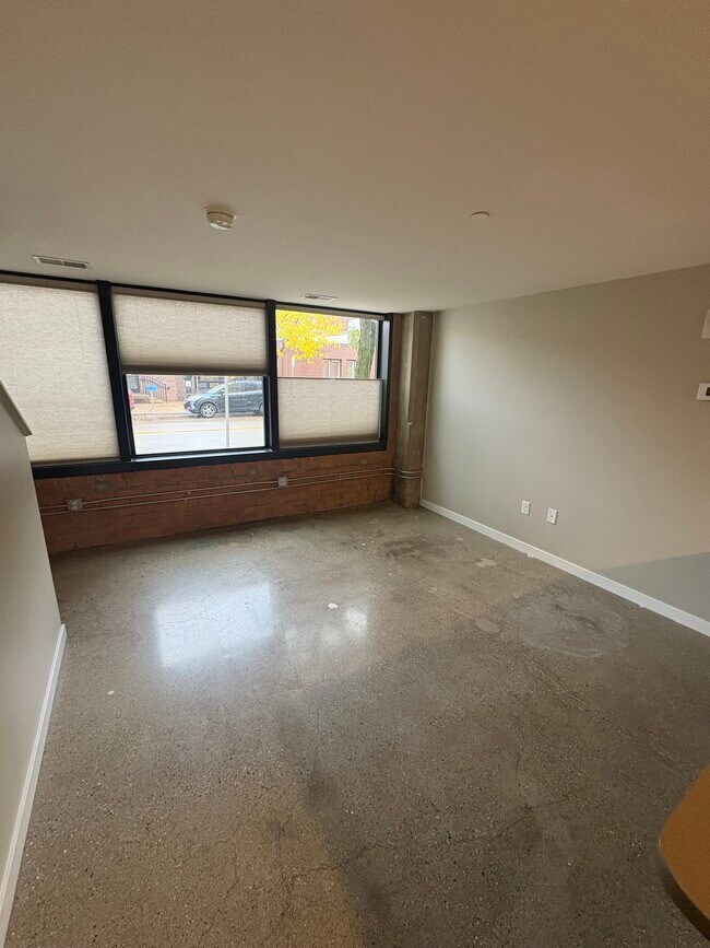 Living Room Blinds Drawn - Firestone Lofts