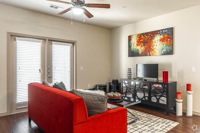 2BR, 2BA - 1,075SF - Living Room - Anatole at City View