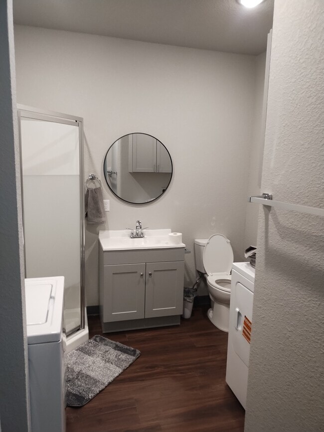 Bathroom with washer and dryer - Graystone Trail