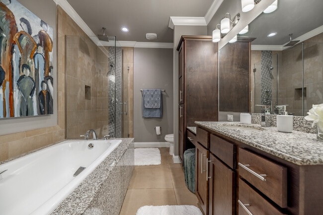 Bathrooms that feature both walk-in shower and tub - River Pointe North