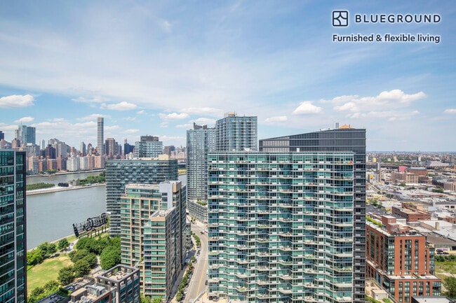 Photo - 4-75-75 48th Ave Unit FL33-ID849