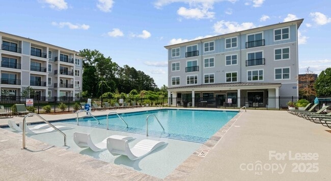 Building Photo - 5120-5177 77 Center Dr Unit 2A