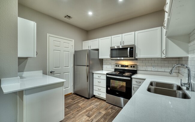 Kitchen with Stainless Steel Appliances Dishwasher and Garbage Disposal - Mountainside