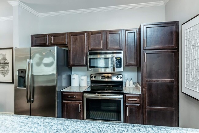 ENJOY MODERN STAINLESS STEEL APPLIANCES - Monarch Apartments