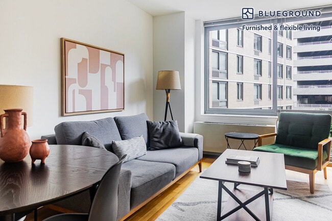 Building Photo - 4-75-75 48th Ave Unit FL3-ID1844