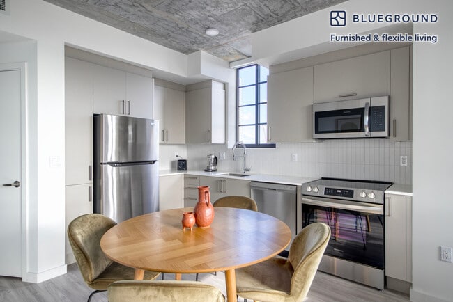 Photo - 23 NE 17th Ter Unit FL16-ID98