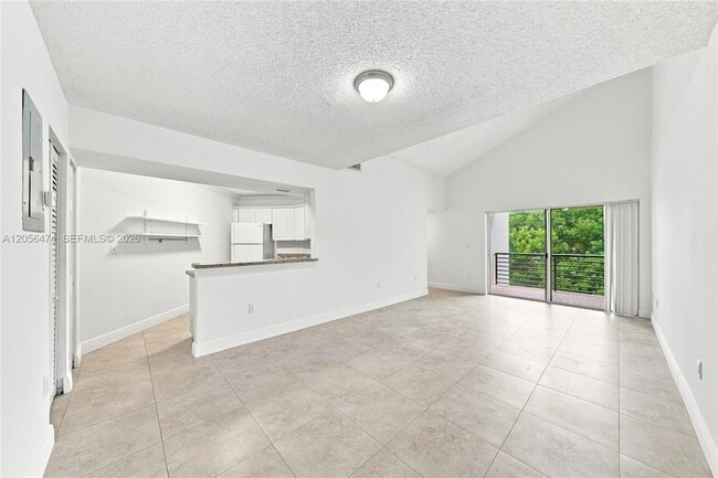 Building Photo - 9735 Fontainebleau Blvd Unit G310