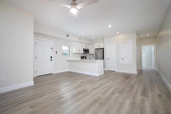 Quartz countertops, stainless appliances, and oversized island - Mistletoe Manor