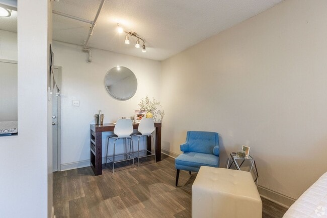 Dining area with hardwood-style flooring & overhead lighting - 500 Fifth