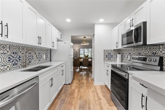 Building Photo - 12750 SW 4th Ct Unit 105J