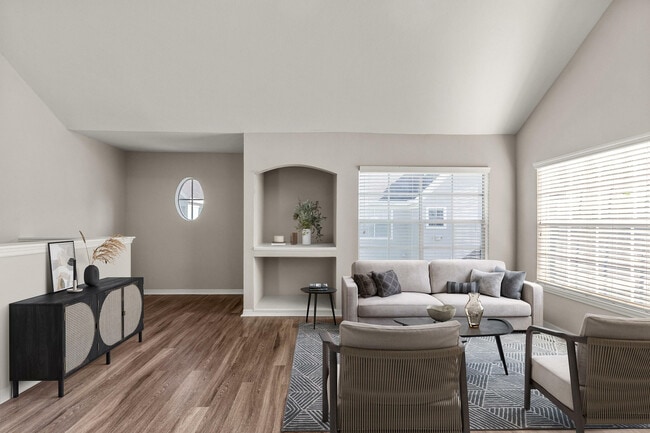 Experience the elegance of a living room that combines comfort with modern style. - Solace Timacuan