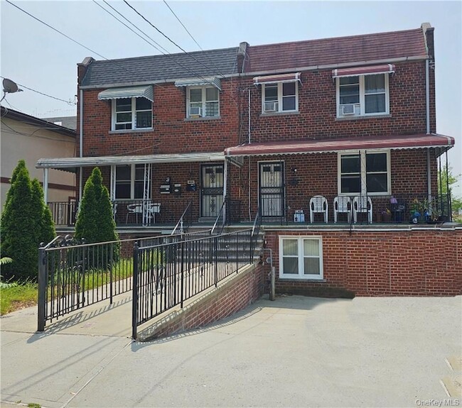 Building Photo - 1022 E 211th St Unit 2