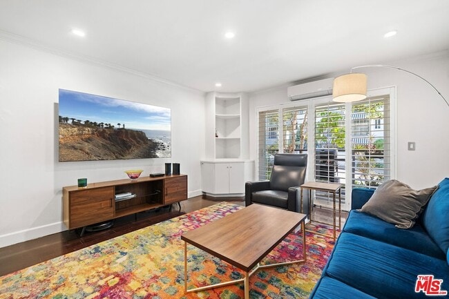 Building Photo - 9005 Cynthia St Unit 208