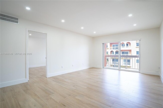 Building Photo - 7720 Camino Real Unit E307