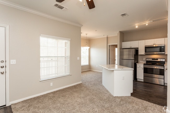 1BR, 1BA - 843SF Living Room & Kitchen - The Oaks at Bentwater