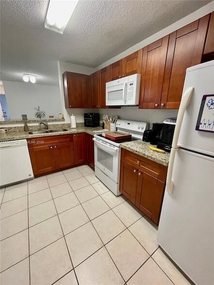 Building Photo - 11229 W Atlantic Blvd Unit 101