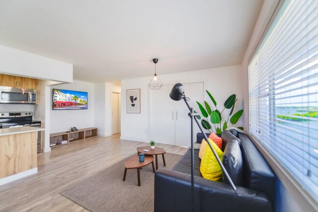 Building Photo - 7904 West Dr Unit FL5-ID1022320P