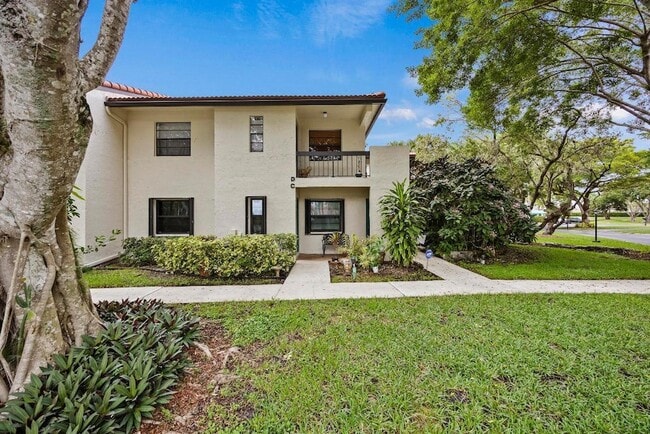 Building Photo - 21691 Tall Palm Cir Unit 3C