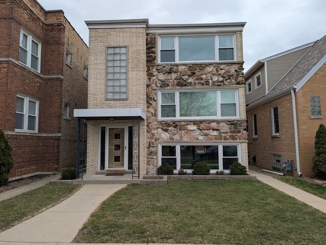 Building Photo - 6537 N Natoma Ave Unit 2