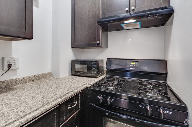 1BR, 1BA + Den - 625SF - Kitchen - Marquette on the Hill