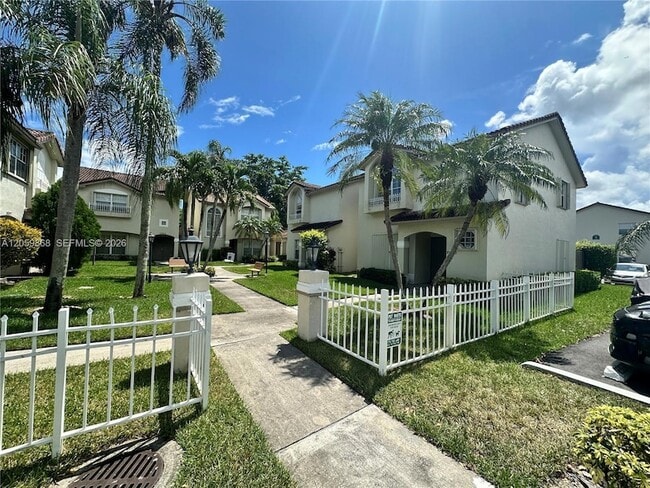 Building Photo - 10807 NW 8th St Unit 7U6