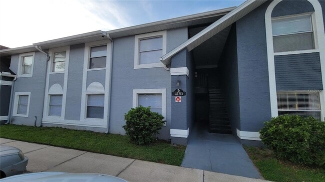 Building Photo - 4136 Pershing Pointe Pl Unit 5