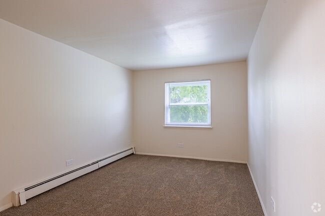 2BR, 1BA - 890SF - Primary Bedroom - Green Oaks Apartments