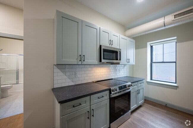 2BR, 1BA - 820 SF - Kitchen - Sacred Heart Lofts