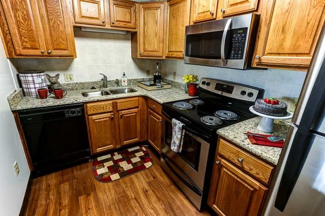 Kitchen with Breakfast Bar - Windsong Place Apartments