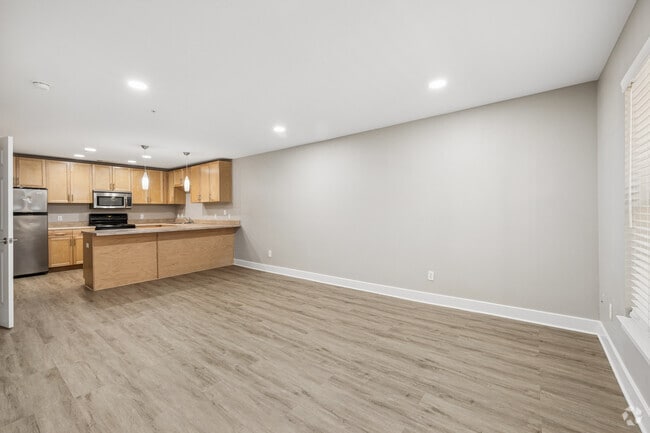2BR, 1BA - 1,032SF - Living Room, Dining Room & Kitchen - Thirty Two West