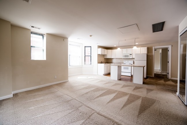 Continental Towers-Living Room - The Continental Towers at Vermont Place