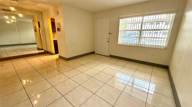 Building Photo - 1629 NW N River Dr Unit 104