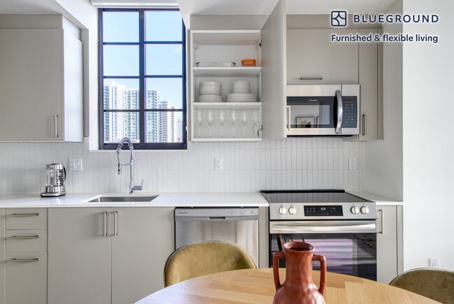 Photo - 23 NE 17th Ter Unit FL16-ID98